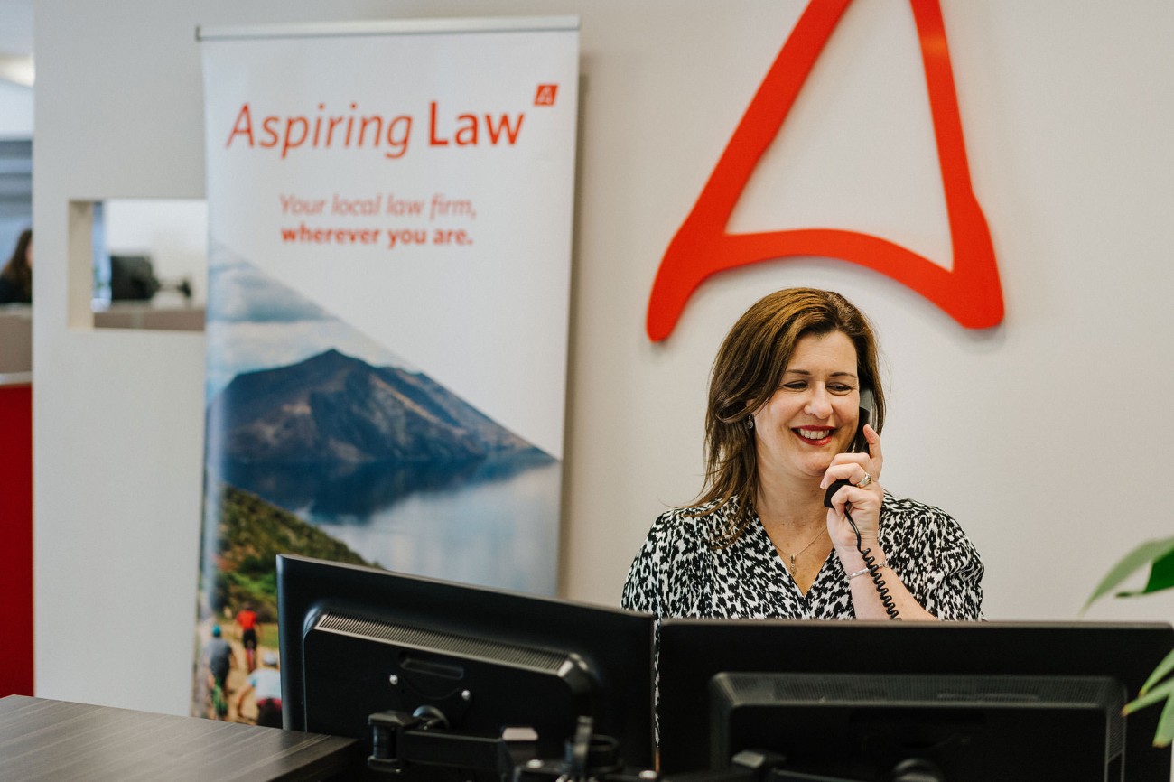 Aspiring Law reception answering a call