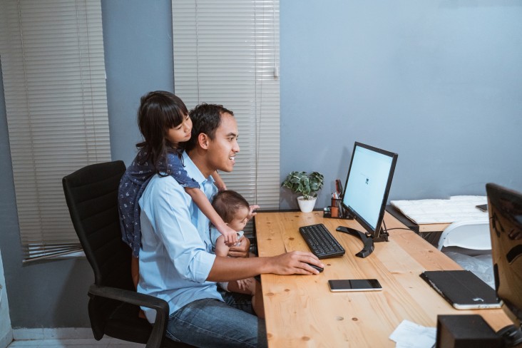 Man working from home with kids