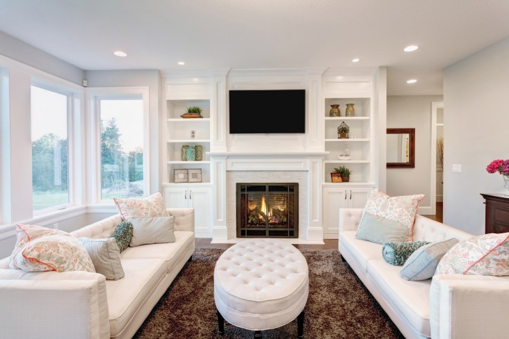 Living room with white couches