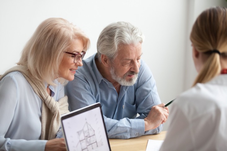 Elderly couple discuss and plan