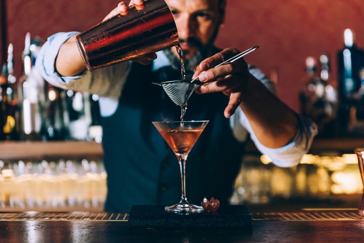 Bartender making cocktail