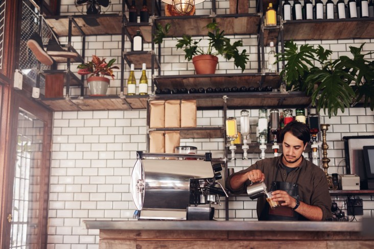 Barista making coffee