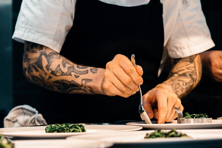 Chef plating food