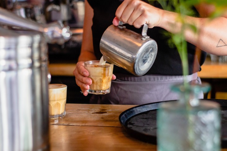 Barista making coffee